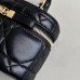 Dior-inspired mini vanity case displayed on shelf