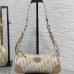 Side Profile of Replica 30 Montaigne Mini Bag - Compact Travel Design