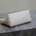 Model holding Replica Dior Diorstar Hobo Bag
